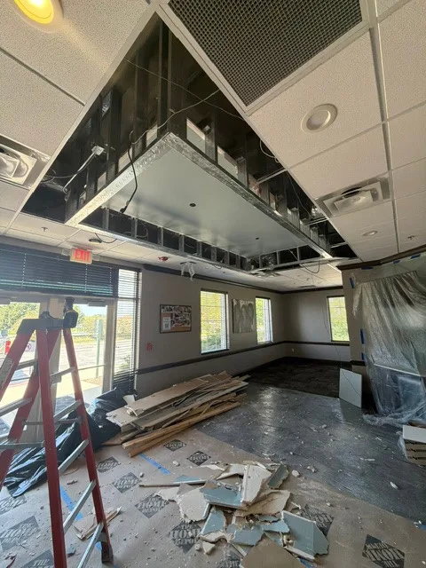 Commercial interior with ceiling demolition in progress